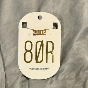 8 Other Reasons “2002” logo gold tone necklace. Great gift! 16”L. Brand new!